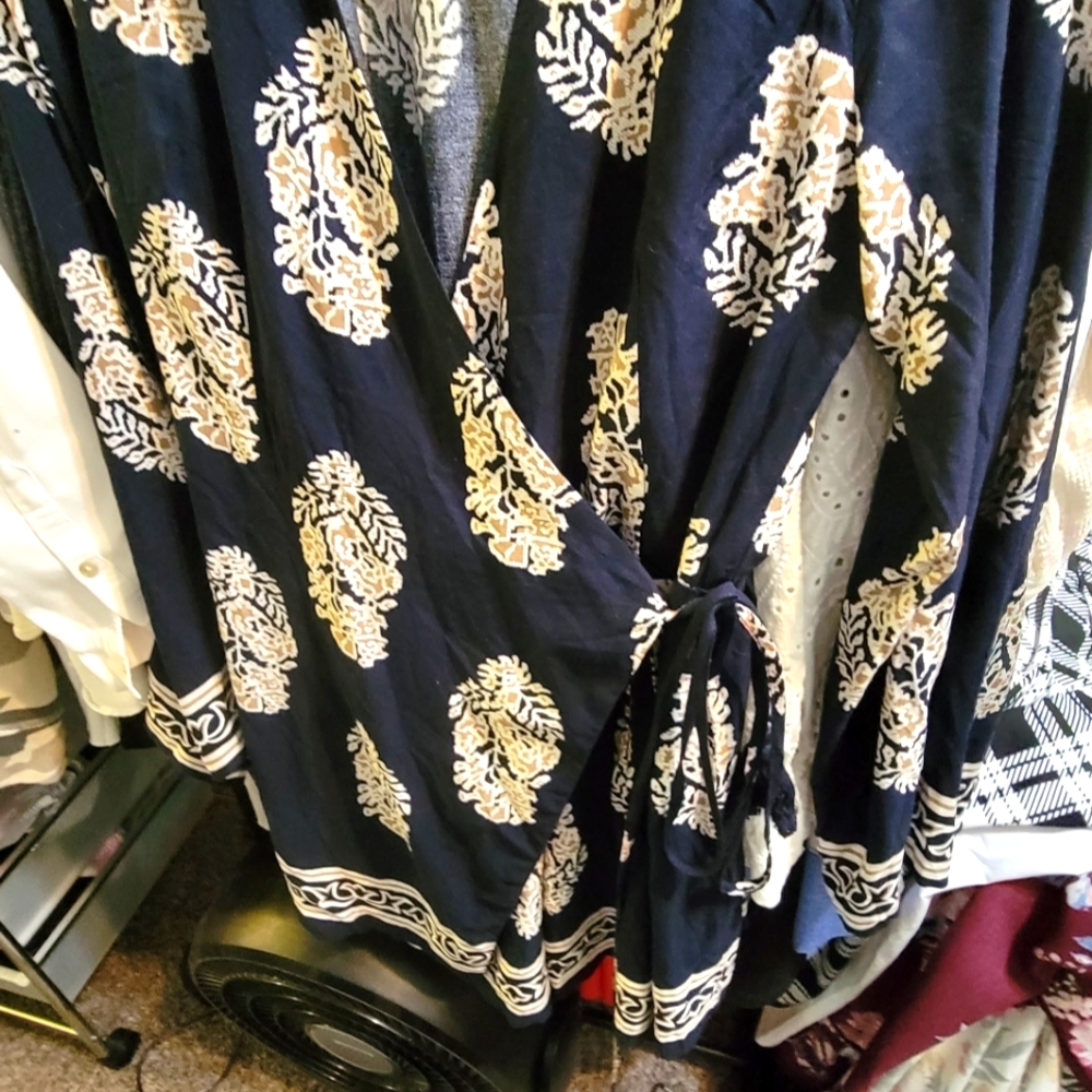 Women size large Romper.  Brand new and has never been worn.